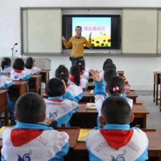 Every one ____ to their teacher now.