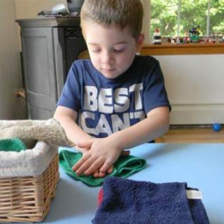 The boy —— the paper.