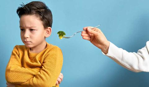 <p>It’s ____________ impossible to get him to eat vegetables.</p>