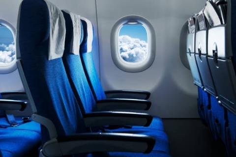 <p>Which seat would you choose if you prefer sitting next to the walkway on a plane?</p>