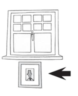 <p>The picture is ______ the door.</p>