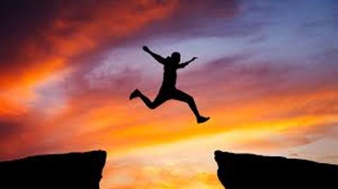 <p>This man is (  ) across the cliff.</p>