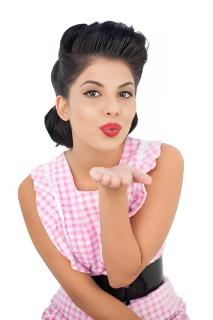 <p>She is blowing a ( ) to her husband.</p>