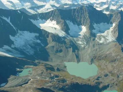 <p>As a mountain glacier starts to move, it plucks rock from the surface, forming a basin in the mountains called a __________.</p>